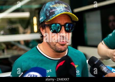 Miami Gardens, United States. 02nd May, 2024. Spanish Formula One driver Fernando Alonso of Aston Martin is interviewed in the paddock during the Formula One Miami Grand Prix at the Miami International Autodrome in Miami Gardens, Florida on Thursday, May 2, 2024. Photo by Greg Nash/UPI Credit: UPI/Alamy Live News Stock Photo