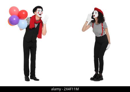 Two funny mimes performing on white background Stock Photo