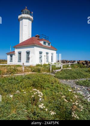 The Point Wilson Light is an active aid to navigation located in Fort Worden State Park near Port Townsend, Jefferson County, Washington State. Stock Photo