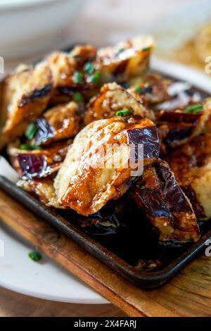 A delicious Chinese dish, deep fried eggplant stuffed with meat Stock Photo