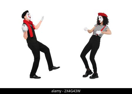 Two funny mimes performing on white background Stock Photo