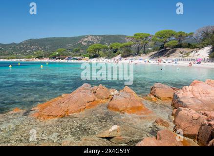 Porto-Vecchio, Corse-du-Sud, Corsica, France. View from rocky headland over clear turquoise water off the Plage de Palombaggia. Stock Photo