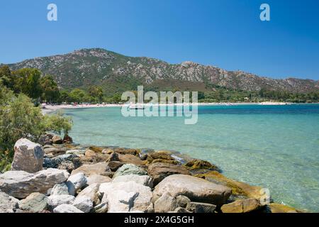 Saint-Florent, Haute-Corse, Corsica, France. View from rocky shoreline across the shallow turquoise waters off Plage de la Roya. Stock Photo