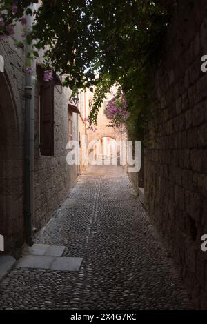 Medieval arched street in the old town of Rhodes Stock Photo