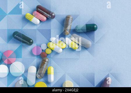 Pills capsules, transparent technology triangles and particle style design. Digital medical and health care concept background Stock Photo
