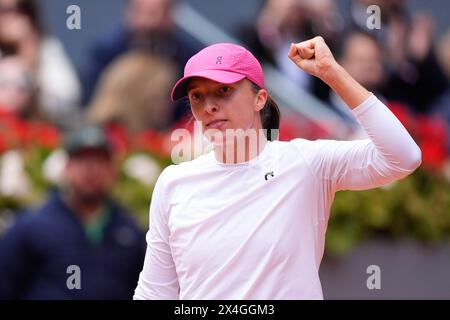 Iga Swiatek of Poland celebrates after winning against Madison Keys of United States during the Mutua Madrid Open 2024, ATP Masters 1000 and WTA 1000, tennis tournament on May 2, 2024 at Caja Magica in Madrid, Spain Stock Photo