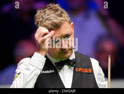 Kyren Wilson reacts during their semi-final match against David Gilbert (not pictured) on day fourteen of the 2024 Cazoo World Snooker Championship at the Crucible Theatre, Sheffield. Picture date: Friday May 3, 2024. Stock Photo