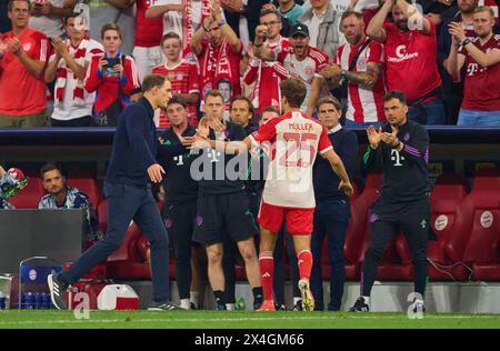 Thomas MUELLER, MÜLLER, FCB 25  Trainer Thomas Tuchel (FCB), team manager, headcoach, coach,   in the semi final match   FC BAYERN MUENCHEN - REAL MADRID 2-2 of football UEFA Champions League in season 2023/2024 in Munich, Apr 30, 2024.  Halbfinale,, FCB, München Photographer: ddp images / star-images Stock Photo