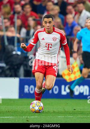 Jamal MUSIALA, FCB 42  in the semi final match   FC BAYERN MUENCHEN - REAL MADRID 2-2 of football UEFA Champions League in season 2023/2024 in Munich, Apr 30, 2024.  Halbfinale,, FCB, München Photographer: ddp images / star-images Stock Photo