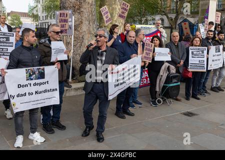 London, UK. 1st May, 2024. People protest outside Downing Street against the UK government's recently passed Safety of Rwanda bill and plans for deportation flights. The emergency protest, led by Iraqi and Iranian refugee groups and attended by trade unionists, the Labour Campaign for Free Movement and other refugee organisations, called for an immediate halt to the Rwanda deportation plan, for the release of all detained asylum seekers and for an end to immigration detention. Credit: Mark Kerrison/Alamy Live News Stock Photo