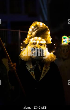 Basel, Switzerland - February 19th 24. Single illuminated carnival mask Stock Photo