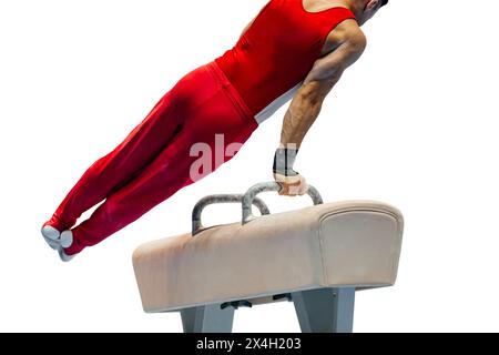 male gymnast exercising on pommel horse, isolated on white background Stock Photo