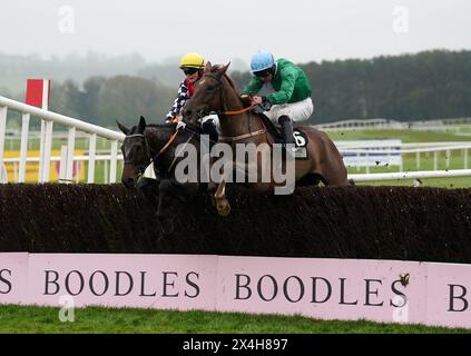 Private Ryan ridden by Jamie Scallan jumps the last on the way to winning the Stanley Asphalt Hunters' Chase for the Bishopscourt Cup during day four of the Punchestown Festival at Punchestown Racecourse, County Kildare. Picture date: Friday May 3, 2024. Stock Photo