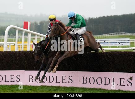 Private Ryan ridden by Jamie Scallan jumps the last on the way to winning the Stanley Asphalt Hunters' Chase for the Bishopscourt Cup during day four of the Punchestown Festival at Punchestown Racecourse, County Kildare. Picture date: Friday May 3, 2024. Stock Photo