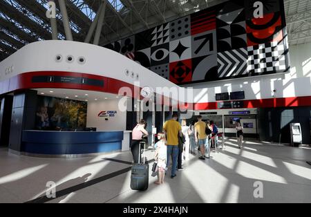 (240503) -- NOVI SAD, May 3, 2024 (Xinhua) -- Passengers queue up to buy tickets at Belgrade railway station in Belgrade, Serbia, April 29, 2024. The Budapest-Belgrade railway is one of the flagship projects of China's Belt and Road Initiative.   The around 80-km-long, Belgrade-Novi Sad railway section started operation on March 19, 2022. (Xinhua/Li Ying) Stock Photo