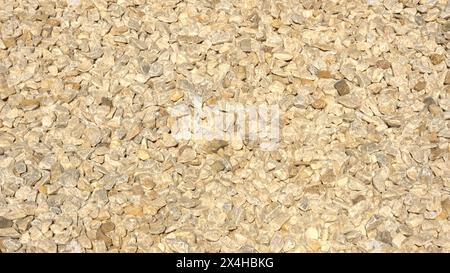 Close-up view of a large collection of decorative, small, light-colored gravel stones Stock Photo