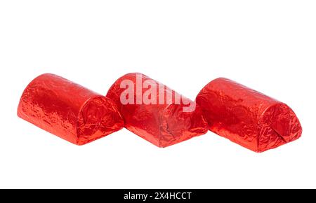 chocolate candies in foil isolated on white background Stock Photo