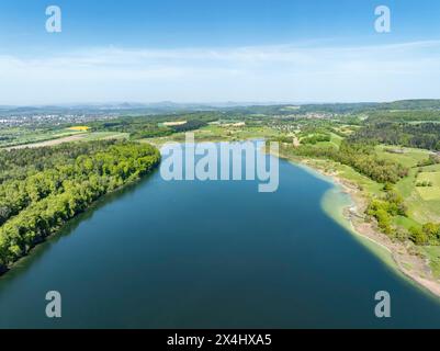 Aerial view of Lake Mindelsee, a glacial tongue lake on the Bodanrueck, with the Hegau Mountains on the horizon, district of Constance Stock Photo