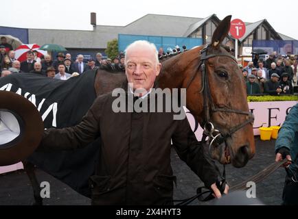 Trainer Willie Mullins with Ballyburn after winning the Alanna Homes Champion Novice Hurdle during day four of the Punchestown Festival at Punchestown Racecourse, County Kildare. Picture date: Friday May 3, 2024. Stock Photo