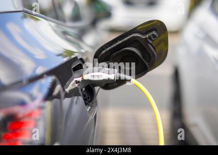 Electric cars at charging stations, Dresden, Saxony, Germany Stock Photo