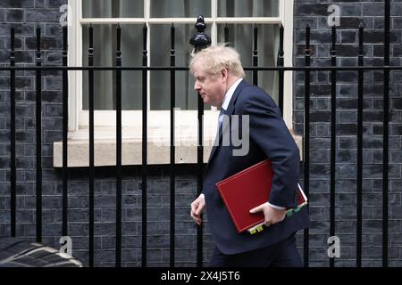 British Prime Minister Boris Johnson walks outside Downing Street in London, Britain, February 9, 2022. Stock Photo