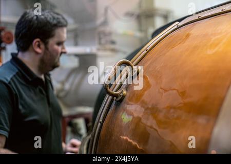 The mash tun is filled with soaked barley and yeast is added to start the fermentation at Glengoyne Distillery - Dumgoyne, Stirlingshire, Scotland, UK Stock Photo