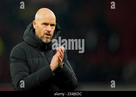 Coach Erik ten Hag applauds at the end of the soccer match between Manchester United and Chelsea at Old Trafford in Manchester, England, Dec. 6, 2023. Stock Photo