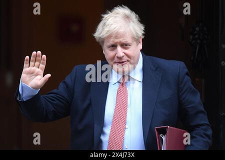 Prime Minister Boris Johnson leaves 10 Downing Street for PMQ's on March 25, 2020 in London, England. Stock Photo