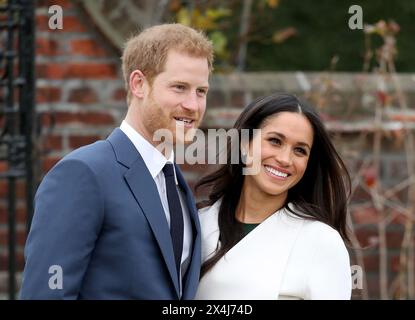Prince Harry and actress Meghan Markle after announcing their engagement at Kensington Palace on November 27, 2017 in London, England. Stock Photo