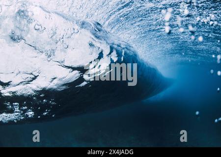 Wave underwater. Blue ocean in underwater. Surfing barrel wave Stock Photo