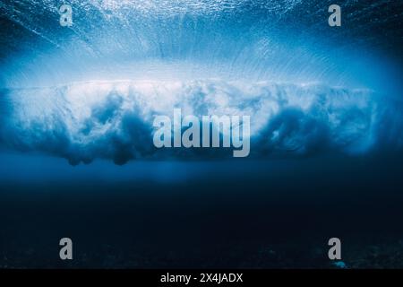 Wave underwater. Blue ocean in underwater. Surfing barrel wave Stock Photo