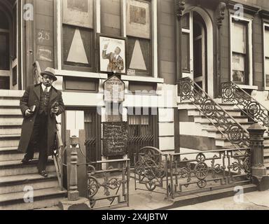 Man standing on steps, Church of God, 25 East 132nd Street, New York City, New York, USA, Berenice Abbott, Federal Art Project, 'Changing New York', December 1936 Stock Photo