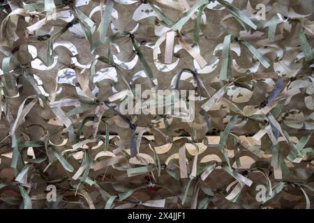 Kyiv, Kyiv City, Ukraine. 3rd May, 2024. Volunteers at ''žVolunteer Center - Help Army and Civilians' making camouflage nets for Ukrainian frontline soldiers. (Credit Image: © Andreas Stroh/ZUMA Press Wire) EDITORIAL USAGE ONLY! Not for Commercial USAGE! Stock Photo