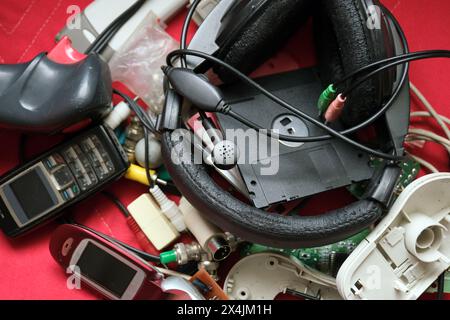 Electronic devices that have reached the end of their technological life. Electronics waiting for recycling or e-waste. Stock Photo
