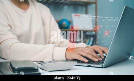 Business woman marking dates on virtual calendar, managing his business schedule, setting reminders for important appointments, creative collage for p Stock Photo