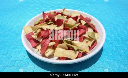 Roasted mix veg Paped made of whole wheat flour, vegetable pulp, crunchy tea-time Indian snacks Stock Photo