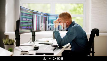 Data Analyst Man Using Spreadsheet On Computer Stock Photo