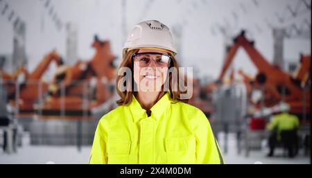 Senior Staff Worker At Car Robot Production Automotive Plant Stock Photo