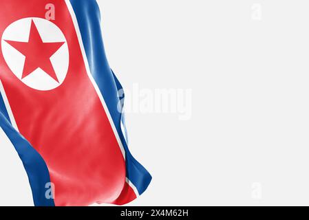 National flag of North Korea flutters in the wind. Wavy North Korea Flag. Close-up front view. Stock Photo