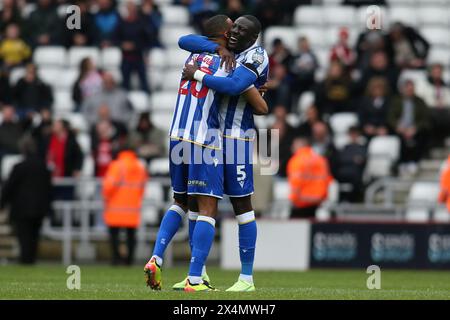 Sheffield Wednesday's Michael Ihiekwe and Sheffield Wednesday's Bambo Diaby celebrate at full time during the Sky Bet Championship match between Sunderland and Sheffield Wednesday at the Stadium Of Light, Sunderland on Saturday 4th May 2024. (Photo: Michael Driver | MI News) Credit: MI News & Sport /Alamy Live News Stock Photo