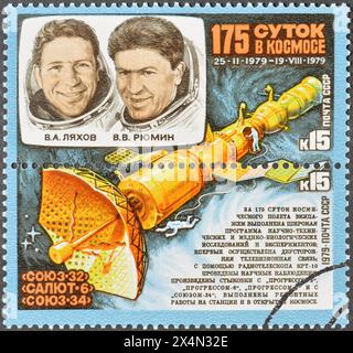 Cancelled postage stamps printed by Soviet Union, that show Vladimir Lyakhov, Valery Ryumin and Salyut 6, Research on Orbital Space Complex. Stock Photo