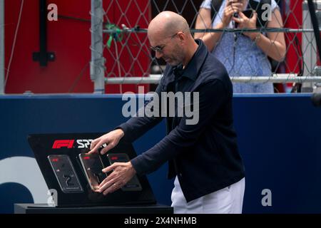 Miami Gardens, United States. 04th May, 2024. Retired French professional footballer Zinedine Zidane places the first place sprint plaque at an award presentation following the spring race during the Formula One Miami Grand Prix at the Miami International Autodrome in Miami Gardens, Florida on Saturday, May 4, 2024 Photo by Greg Nash/UPI. Credit: UPI/Alamy Live News Stock Photo