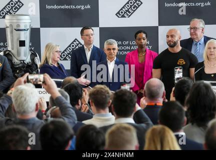 Labour's Sadiq Khan (centre) is re-elected as the Mayor of London, at City Hall, London as Count Binface (left), Conservative party candidate Susan Hall (second left), Liberal Democrat candidate Rob Blackie, Independent candidate Natalie Campbell and Independent candidate Andreas Michli (third right) look on. Picture date: Saturday May 4, 2024. Stock Photo