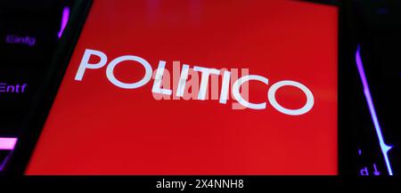Viersen, Germany - May 1. 2024: Closeup of smartphone on computer keyboard with logo lettering of digital online newspaper Politico Stock Photo