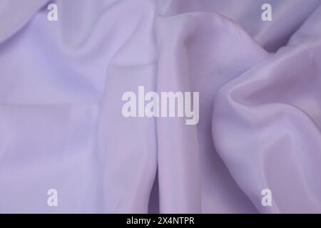 A bright plain white fabric with an intricate detailed texture Stock Photo