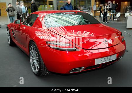 A red Mercedes SLS AMG is presented at a car show, Stuttgart Messe, Stuttgart, Baden-Wuerttemberg, Germany Stock Photo
