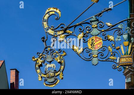 Wrought iron nose shield from 1632 with coat of arms and lamb, Kaufbeuern, Allgaeu, Swabia, Bavaria, Germany Stock Photo