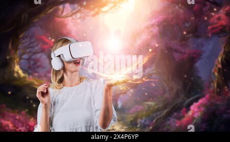 Girl with VR goggles and standing while holding light flare and standing at magical forest. Woman looking at hologram in hands while connecting Stock Photo