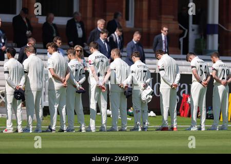 London. 4th May 2024. Middlesex players pay their respects to Worcestershire spinner Josh Baker before the second day of the County Championship Division Two match between Middlesex and Leicestershire at Lord’s Cricket Ground. Credit: Matthew Starling / Alamy Live News Stock Photo