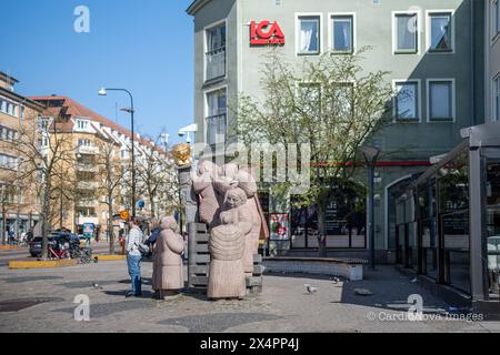 Skvallertorget or the Gossip square with a sculpture by Pye Engstrom in Norrköping during spring in Sweden.  Norrköping is a historic industrial town. Stock Photo